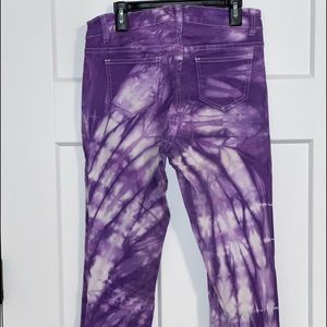 Purple tie-dye jeans